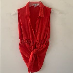 Burnt orange blouse with midriff cutouts